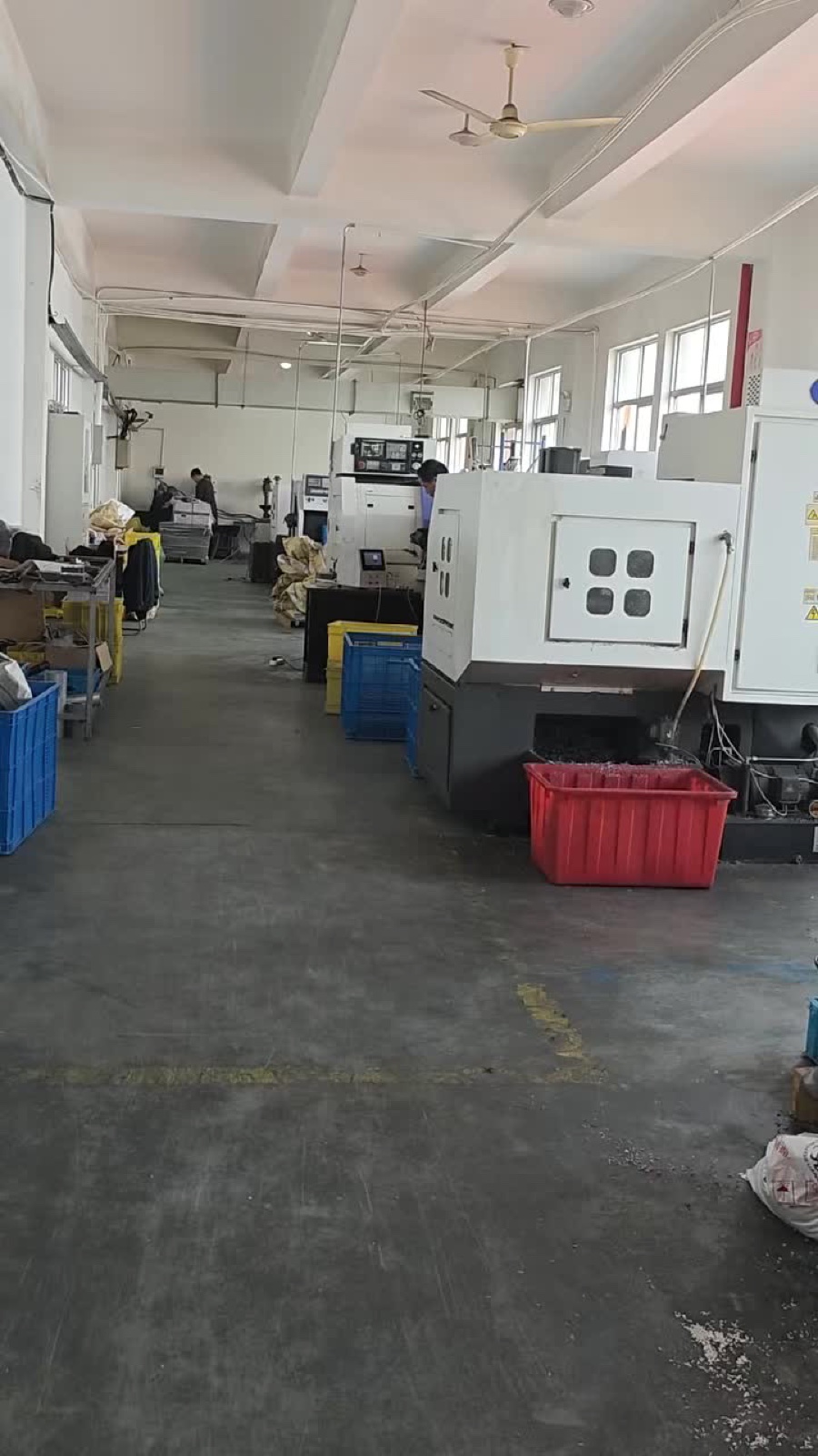 CNC machining aisle at Shenghe Motor factory in Cixi, Ningbo